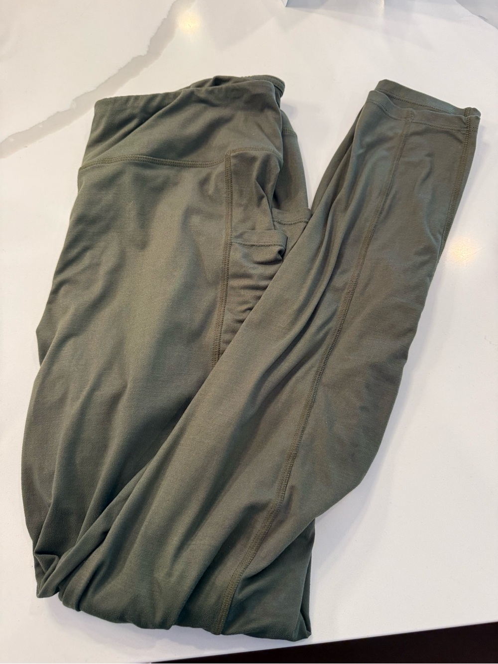 Green Satina Plus Size Soft Leggings. Polyester Blend. Pockets. Machine Wash.